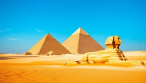 Pyraminds of Giza standing majestically against a bright blue sky.